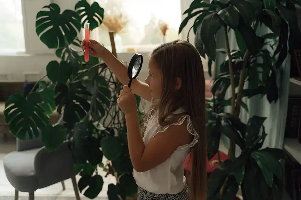 Botanical expert examining plants in a bright corporate setting